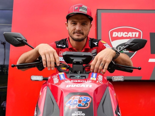 Jack Miller on the VMotoSoco CPx electric scooter of the Ducati Lenovo MotoGP team